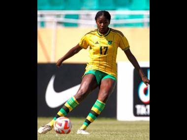 Jamaica under-20’s Taijah Fraser lines up to kick the ball during her team’s Concacaf Under-20 Women’s Championship football game against Panama at the Estadio Felix Sanchez in the Dominican Republic yesterday. 