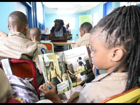 In this January photo, students are seen reading at a 'Drop everything and Read' session at Grove Primary School in East Rural St Andrew.