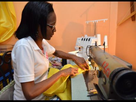 Nadine Walters gets busy, creating another stylish piece for her bag line.