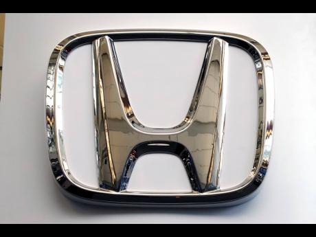 The Honda logo on a 2019 Honda Civic on display at the 2019 Pittsburgh International Auto Show in Pittsburgh. 