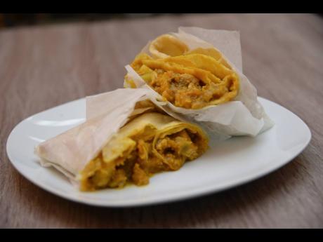 The tantalising curried chicken dhalpuri wrap with boneless chicken, aloo and channa, pumpkin talkari and curried mango is more than a mouthful.
