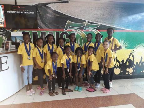 Members of the all-star school team that participated in the Coconut Gymnastics Classic in St Vincent and the Grenadines from February 23-24.