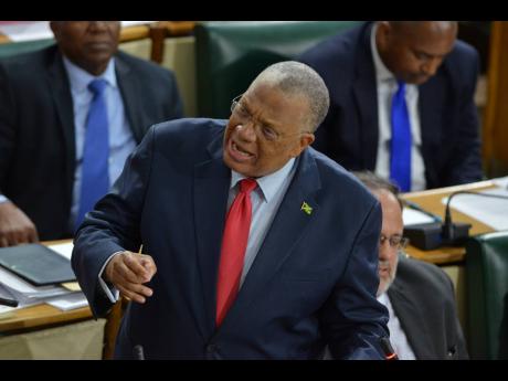 Opposition Leader Dr Peter Phillips making his contribution to the Budget Debate at Gordon House on Thursday. 