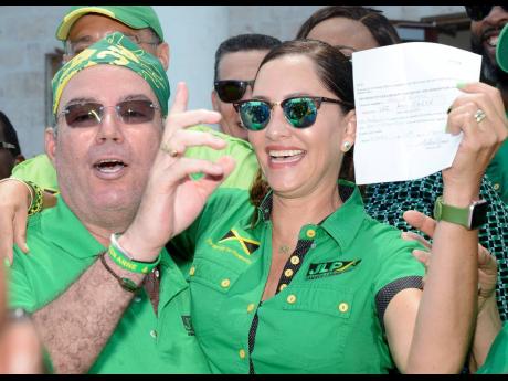 Ann Marie Vaz and husband Daryl are animated after she was nominated at the Portland Court House on Friday. The Portland East by-election will be held on April 4. 