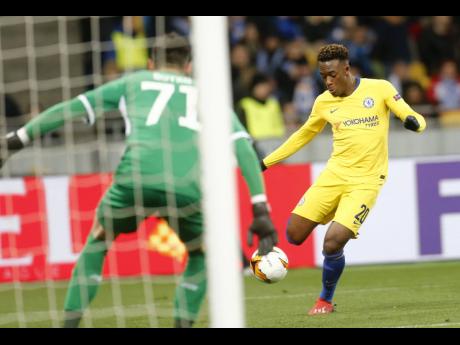 Chelsea’s Callum Hudson-Odoi scores his side’s fifth goal during the Europa League round of 16 second-leg match against hosts Dynamo Kiev at the Olympiyskiy Stadium in Kiev, Ukraine, on Thursday. 