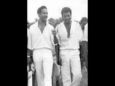 William Haye (right) with West Indies great Sir Garfield Sobers in 1973. Sobers was conducting a cricket coaching clinic in the parish. 