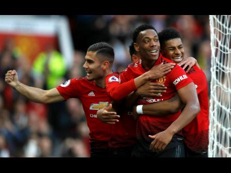 
Manchester United’s Anthony Martial (centre) celebrates scoring his side’s second goal during the English Premier League match between Manchester United and Watford at Old Trafford Stadium yesterday.