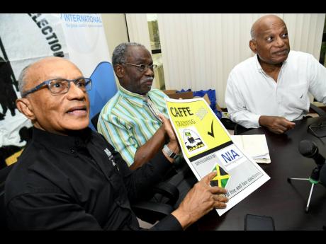 From left: Professor Trevor Munroe, executive director of National Integrity Action (NIA); Lloyd Barnett, chairman of Citizens Action for Free and Fair Elections (CAFFE); and Anton Thompson, director of CAFFE, address the media at an NIA-CAFFE joint press conference last Thursday.