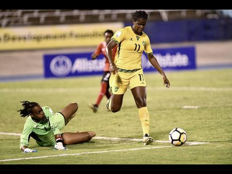Jamaica’s Khadija ‘Bunny’ Shaw (right), pictured here in a game against Trinidad and Tobago on Friday, August 31, 2018, was the Reggae Girlz’s goalscorer in their friendly international with South Africa, which ended in a 1-1 draw in Durban. 