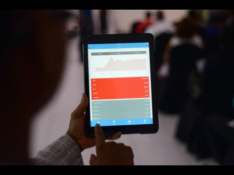 Trading activity on the Jamaica Stock Exchange is diplayed through the JSE mobile app.