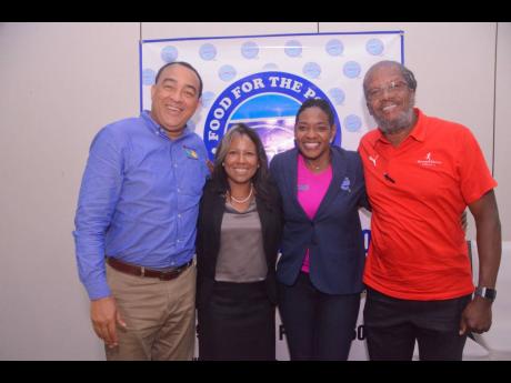 From left: Dr Christopher Tufton, minister of health; Stacey Halsall-Peart, chief operating officer of Advanced Integrated Systems; Marsha Burrell-Rose, development and marketing manager of Food For The Poor Jamaica; and Alfred ‘Frano’ Francis were privileged to be part of the Food For The Poor 5k walk/run launch on Tuesday, April 16 at the Spanish Court Hotel.
