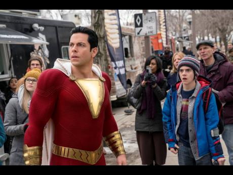 Zachary Levi (left) and Jack Dylan Grazer in a scene from ‘Shazam!’