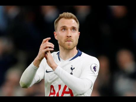 Tottenham’s Christian Eriksen greets fans after the English Premier League match between Tottenham Hotspur and Brighton & Hove Albion at Tottenham Hotspur stadium in London, yesterday. Eriksen scored the lone goal in Tottenham’s 1-0 win.