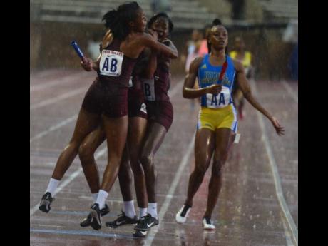 Holmwood High School's Girls' 4x400m relay team celebrate their victory in the High School Girls' Championships of America race at the Penn Relays in Philadelphia, Pennsylvania yesterday.

Collin Reid photo courtesy of Team Jamaica Bickle, Courts Jamaica, Supreme Ventures and Guardian Life.