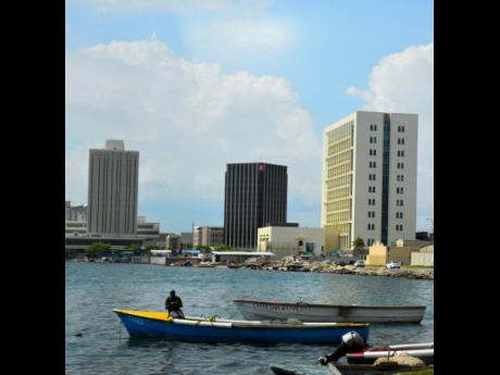
The Bank of Jamaica is pictured at left and Scotiabank at right on the Kingston waterfront. Although the central bank is supposed to be the holder of a single account for government funds after adjustments to the law in 2009, some $40 billion is still sitting in commerical banks.