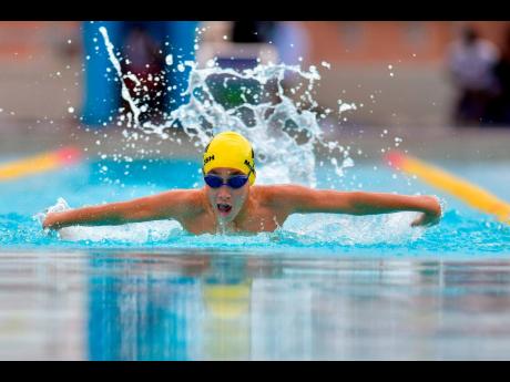 Christian McIntosh of St George’s College competing in the Boys’ 12 and under 50m butterfly event at the Mayberry Swim Meet held at the National Aquatics Centre on Friday April 5.