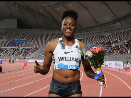 Jamaica’s Danielle Williams celebrates winning the women’s 100m hurdles event during the IAAF Diamond League in Doha, Qatar, yesterday. 
