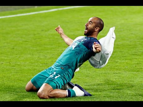 Tottenham's Lucas Moura celebrates in front of the fans at the end of the Champions League semifinal second leg football match against Ajax at the Johan Cruyff ArenA in Amsterdam, Netherlands, yesterday. Tottenham won the game 3-2. (AP Photo).