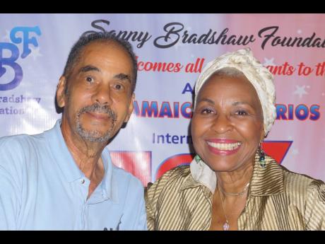 Fab 5’s Frankie Campbell with Myrna Hague at the media launch of International Ocho Rios Jazz Festival, last Thursday at The Wine Shop in St Andrew.