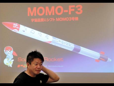 
Japanese entrepreneur and founder of Interstellar Technologies Inc. Takafumi Horie speaks during a press conference in Tokyo, Wednesday, May 15, 2019. Horie said a low-cost rocket business in Japan is well-positioned to accommodate scientific and commercial needs in Asia. While Japan’s government-led space programs have demonstrated top-level technology, he said that the country has fallen behind commercially due to high costs. 