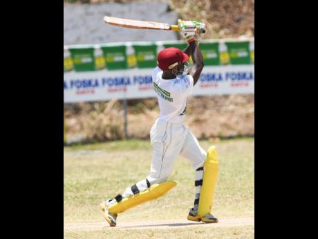 Leronne Tyrell of Rio United on his way to his century against St Margaret’s Bay in the Social Development Commission/Wray and Nephew National Community Twenty20 cricket competition at Lynch Park in Buff Bay, Portland, yesterday. 