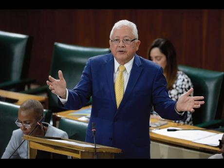 Delroy Chuck, minister of justice, making his presentation during the Sectoral Debate in Parliament last Tuesday.