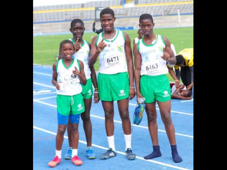 
Finishing the final event, the open boys’ 1600m medley, on Day Two of the JTA/Sagicor National Athletic Championship yesterday are student athletes from the winning Parish Champion of St Andrew (from left) Jamarli Innerarity, Trarell Beckford, Javiere Malcolm, and Jamie Miller.