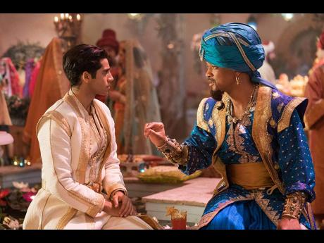 Aladdin stars Mena Massoud (left) and Will Smith. 
