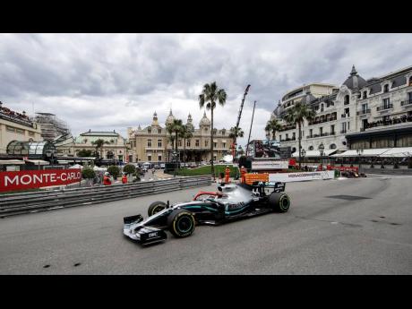 Leading Mercedes driver Lewis Hamilton of Britain out in front during the Monaco Formula One Grand Prix race at the Monaco racetrack yesterday. 