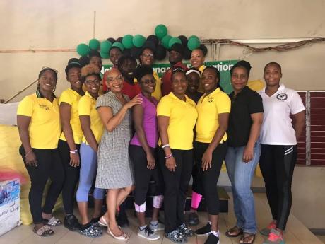 Jamaica Amateur Gymnastics Association board members and coaches in attendance at a workshop held at the Pembroke Hall Gym on Saturday, June 8. Front row (from left): Nicole Grant Brown, Showna Robinson, Shikaira Grant, Carmen Clarke – personal development trainer and life coach, Ashmonique Goodridge, Nadeen Whyte, Tamika Jackson, Crystal Henderson, Clover Gardener, and Ashley Salmon. Back row (from left): Paula White, Jonair Needham, Kimani Airy, Kerieon Grant, Shalto Stanley, and Deborah Bennett.