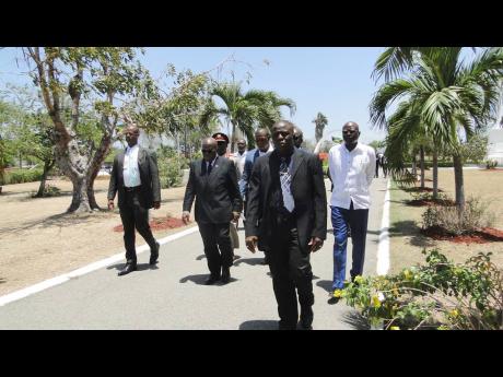 President of Ghana Addo Dankwa Akufo-Addo (second left) and his entourage making their way to the monument of National Hero Marcus Garvey at National Heroes Park on Sunday, June 16. 