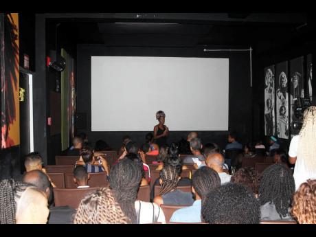 GATFFEST’s deputy festival director Savannah Peridot gives a short welcome to the guests present for Jamaica Film Night 2, held at the Bob Marley Museum on the weekend. 