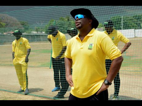 Robert Samuels, former Jamaica and West Indies cricketer, engages coaches from across the island during a West Indies Players’ Association/Wray & Nephew training session at the Kensington Cricket Oval on Wednesday, July 3, 2019.