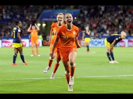 Netherlands’ Jackie Groenen celebrates after scoring during the Women’s World Cup semi-final match between the Netherlands and Sweden, at the Stade de Lyon outside Lyon, France, Wednesday, July 3, 2019.