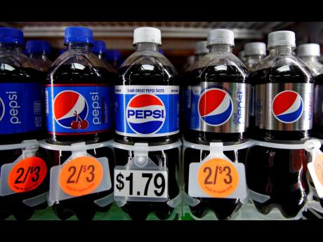 Pepsi soft drink bottles are displayed at a store in Windham, New Hampshire.