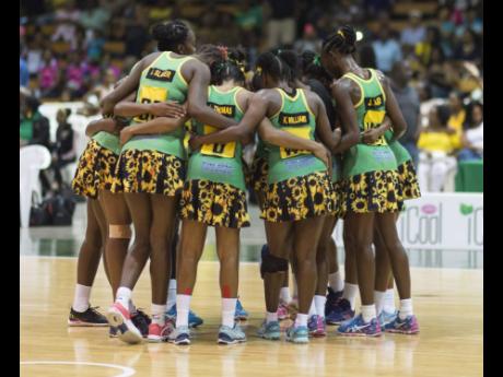 
Members of Jamaica’s national senior netball team, the Sunshine Girls, huddle during the Sunshine Series against England Netball at the National Indoor Sports Centre in Kingston on Saturday, October 13, 2018.