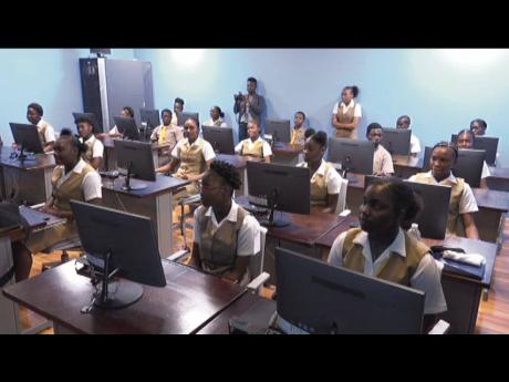 Garvey Maceo High School students in their new computer lab.