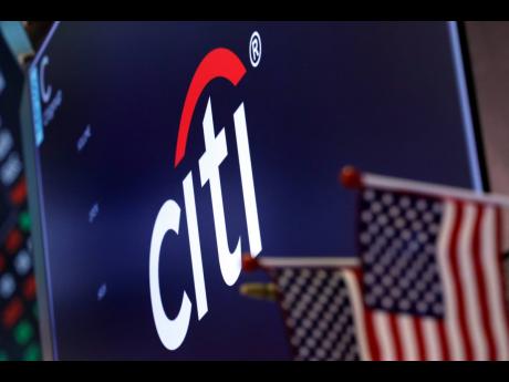 In this February 8, 2019 file photo, the logo for Citigroup appears above a trading post on the floor of the New York Stock Exchange.