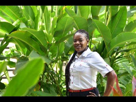 A boss smile! Spa Manager at Sandals Negril, Denise Morrison is all smiles as she posed for a quick picture outside the Red Lane Spa on resort.


