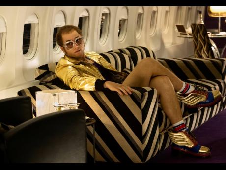 Taron Egerton plays Elton John in a scene from ‘Rocketman’. 