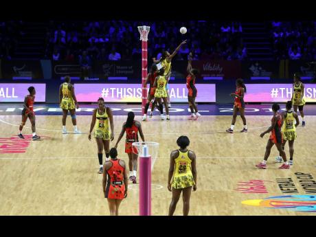 Action from the Vitality Netball World Cup fifth place match between Jamaica and Malawi at the M&S Bank Arena, in Liverpool, England yesterday. 