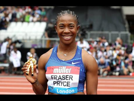 Jamaica’s Shelly-Ann Fraser-Pryce is all smiles after taking gold in the Women’s 100m final during day two of the IAAF London Diamond League meet at the London Stadium in London, England, yesterday. 