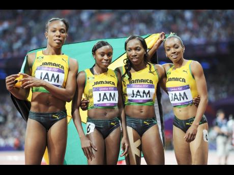 Jamaica’s women’s 4x400m relay team of (from left) Rosemarie Whyte-Robinson, Shericka Williams, Novlene Williams-Mills and Christine Day at the Olympic Games at in London, England on Saturday, August 11, 2012. The team, which finished third in the event, was originally given a bronze medal but since upgraded to silver after a doping sanctions on the Russian team that finished one position higher. 