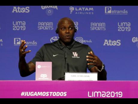 Nine-time Olympic gold medallist Carl Lewis, from the United States, speaks during a press conference during the Pan American Games in Lima, Peru, Monday, August 5, 2019. 