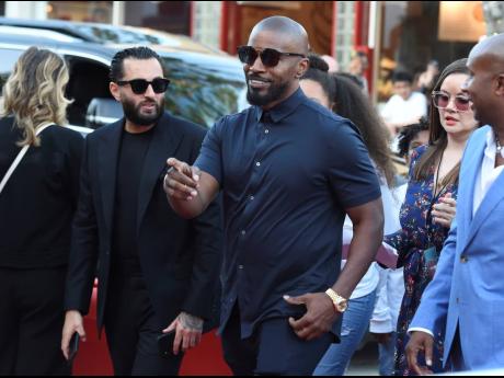 Jamie Foxx (centre) arrives at the Los Angeles premiere of ‘47 Meters Down: Uncaged’ at the Regency Village Theatre on Tuesday, August 13. 