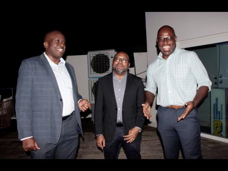 Senior managers at the National Commercial Bank (NCB) are captured enjoying the moment during NCB’s annual staging of the Monday Club. From left are Kevin Ingram, Vernon James and Antonio Spence. 