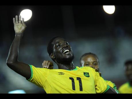 Jamaica’s Shamar Nicholson celebrates his opening goal against Antigua and Barbuda in the Concacaf Nations League at the Montego Bay Sports Complex on Friday. Nicholson scored two goals in Jamaica’s 6-0 win.