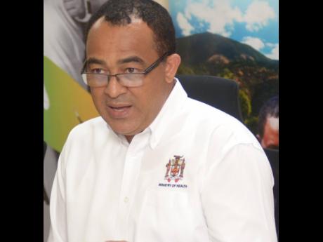 Minister of Health, Dr Christopher Tufton speaking at an emergency press conference at the Ministry of Health in Kingston in January to address news of an outbreak of dengue. The Ministry is now battling an outbreak in St James. 