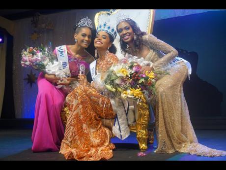 Toni-Ann Singh, Miss Jamaica World 2019,  is flanked by first runner-up Rochelle McKinley (left) and second runner-up Alana Wanliss.