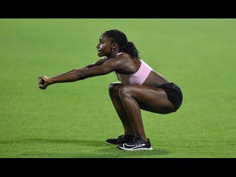 Britain’s Dina Asher-Smith exercises during an evening training session prior the start of the World Athletics Championships in Doha, Qatar, on Wednesday. 